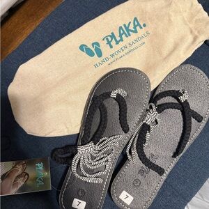 Plaka Hand-Woven Sandals in Black and Gray. NWT